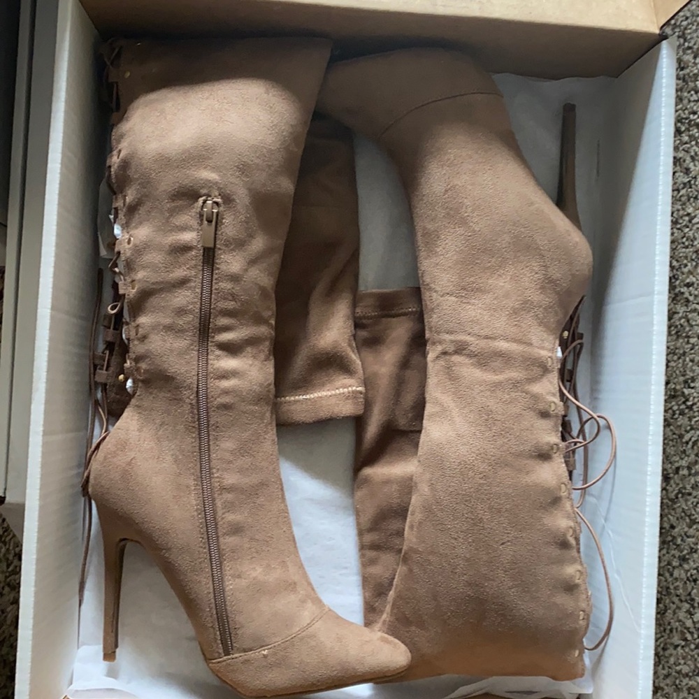Thigh high boots tan with tie up in back